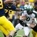 Michigan linebacker Jake Ryan tackles Michigan State quarterback Andrew Maxwell on Saturday. Michigan leads at halftime 6-0. Daniel Brenner I AnnArbor.com